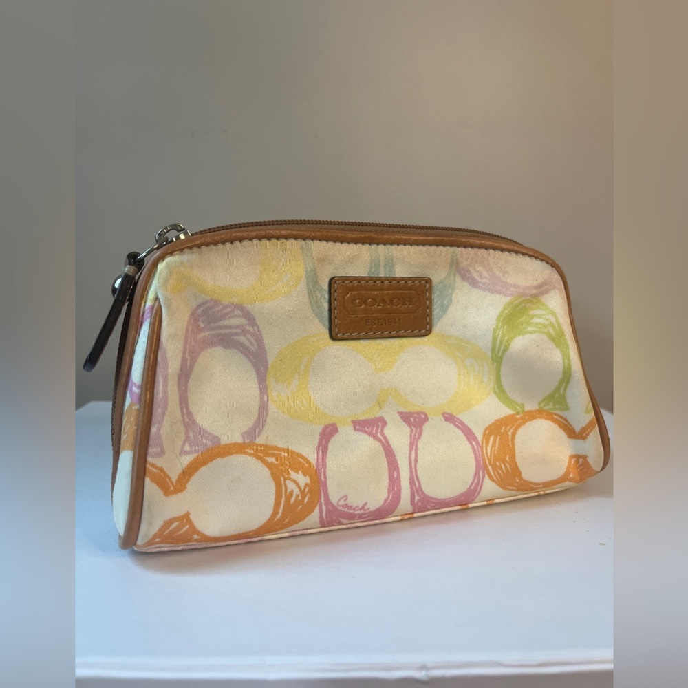 Coach cosmetic pouch, excellent used condition- multi color monogram print
